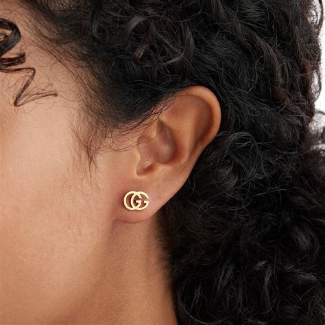 gucci gold earrings|18k gold running g stud earrings.